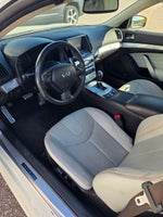 2015 INFINITI Q60 Base 3.7 Liter V6 2D Convertible Automatic